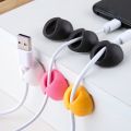 Data cable sorting device Desktop mobile phone data cable storage fixing seat clip Winding car Self-adhesive buckle mouse cable clamp Network sorting cable fixing device. 