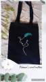 Natural fabric stylish black tote bag with hand paintings for everyday travel, dream catcher design. 