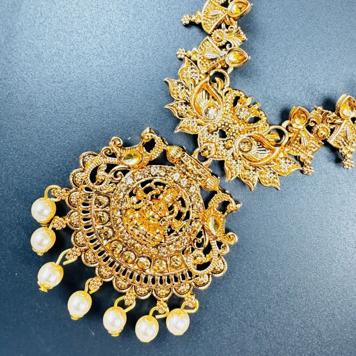 Dull%20gold%20color%20temple%20Design%20long%20necklace%20and%20one%20pair%20earring%20fashion%20jewelry%20necklace%20set%20with%20gold%20and%20of%20white%20pearl%20for%20women%20and%20girl%20-%20Image%203