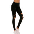 Women's tight black ripped leggings. 