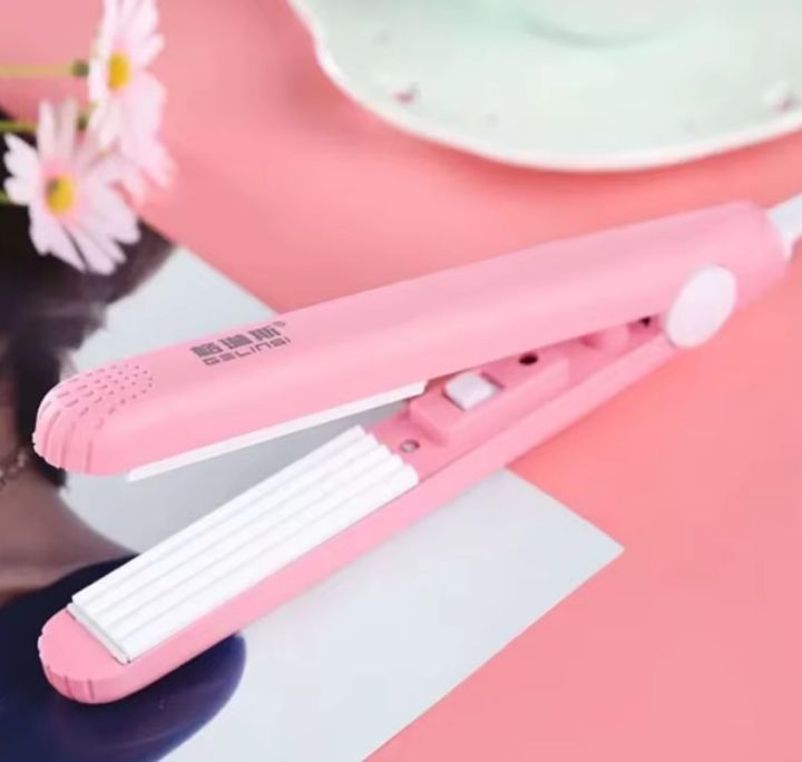 A mini hair iron pink corrugated plate electric curling iron curl ...