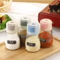 Quantitative seasoning jar glass press salt control bottle seasoning bottle monosodium glutamate salt jar household kitchen metering salt seasoning bottle. 