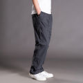 spring summer casual pants male big size 6XL Multi Pocket Jeans oversize Pants overalls elastic waist pants plus size men. 