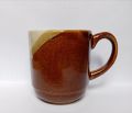Brown color tea mug. 