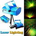 Multi Pattern Mini Laser Light Disco Light Projector Stage Lighting Table Lamp. 