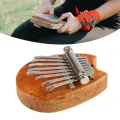 Mini Kalimba Professional Compact Gift Unique Shape Easy To Play Mini Thumb Piano with Lanyard for Collection for Beginner. 