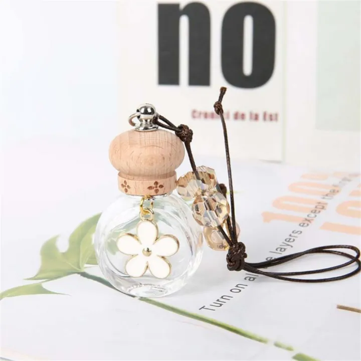 1/2/3PCS%20Car%20Decoration%20Oil%20Bottle%20Lasting%20Fragrance%20Durable%20Daisy%20Metal%20Petals%20Crystal%20Bead%20Wax%20Rope%20Car%20Accessories%20-%20Image%203