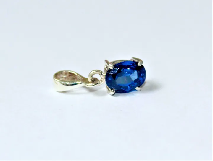 silver%20jewel%20with%20a%20blue%20gem%20-%20Image%203