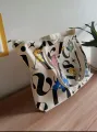 Large-Capacity Canvas Tote Shoulder Bag, Washable Fashionable Messenger Bag for Boys and Girls. 