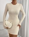 Nessie Black Long Sleeve White Bodycon Short Dress. 