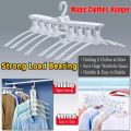 8-in-1 Multi-port Support Circle Clothes Hanger Saves Space Foldable Telescopic Magic Clothes Hanger No-Slip Laundry Rack. 