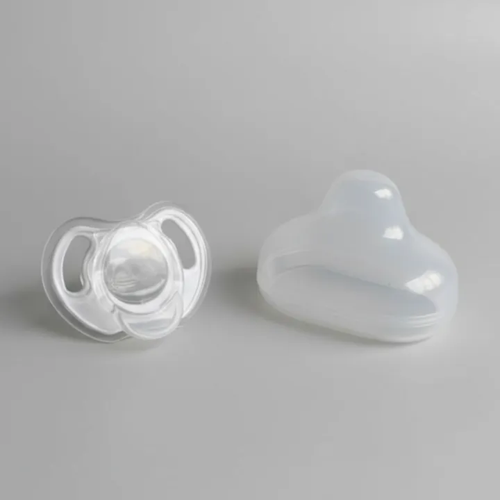 Tommee%20Tippee%20Ultra-Light%20Soft%20Silicone%20Soother%20%E2%80%93%20One-Piece%20%7C%20BPA%20&%20BPS%20Free,%20Curved%20Comfort%20Design%20%7C%200%E2%80%936M%20-%20Image%202