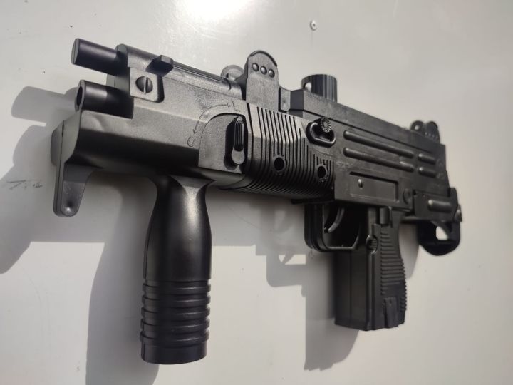 Glock%2018%20-%20Spring-powered%20BB%20Toy%20with%206mm%20Plastic%20Balls,%20Compact%20Design,%20Pull-back%20Trigger%20Action,%20Outdoor%20Game%20Toy%20for%20Children%20Boys%20-%20Image%208