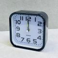 Square Simple Alarm Clock Battery Powered Time Clock Ornament for Home Bedroom Dormitory Party Background. 
