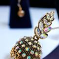 ESH Light gold Indian Vintage Bollywood dangle drop jhumka jimikki earring Trendy Leaf Design Pearl Drop & Multi Stone-Studded earring for women and girl. 
