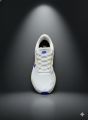 Click & Kick Nike Air Zoom Pegasus  running shoe in the white, blue, and yellow colorway. 