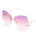 113 New personality diamond-cut rimless rimless sunglasses ladies retro irregular trend wear metal sunglasses uv400. 