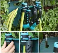 Plastic hose holder wall mount for 15M hose. 