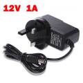 AC/DC Adapter 12V 1A Power Supply. 