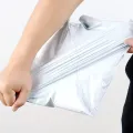 25pcs Courier Bags, Daraz Deliver Bags, Grey color, Waterproof Self Seal Plastic Poly Envelope Mailer Storage Bag Postal Packaging Shipping Mail Bag. 
