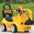 Kids ride on backhoe. 