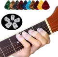 1 and 4 piece Guitar Fingertip Protectors Rubber Guard with Finger Protector Covers Caps for Paperwork, Cutting, Wax Carving, Guitar Playing and Office Supplies Tasks Guitar accessories Silicone Guitar Finger Guards Guitar Fingertip Protection Covers Caps. 