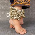 Gold color Indian kathak dance foot accessories gejji, ghungroo paada salan for dancer women. 