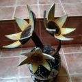Coconut shell flower vase. 