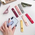 Candy color finger ring holder mobile phone holder stand push pull sticker paste universal hand band phone holder. 