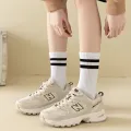 Woman Men Unisex Street Striped Mid Tube Socks Breathable Sports Solid Versatile Striped Black White Socks ZHANGNA. 