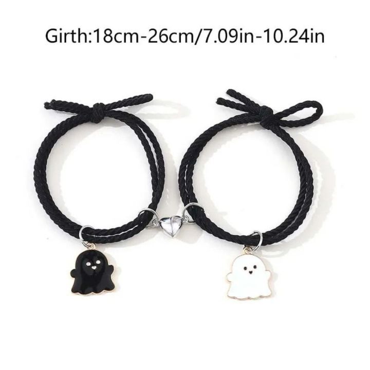 Trendy%20Black%20and%20White%20Halloween%20Couple%20Bracelets%20with%20Love%20Heart%20Pendant%20-%20Adjustable%20Rubber%20Band,%20Matching%20Set%20-%20Image%202