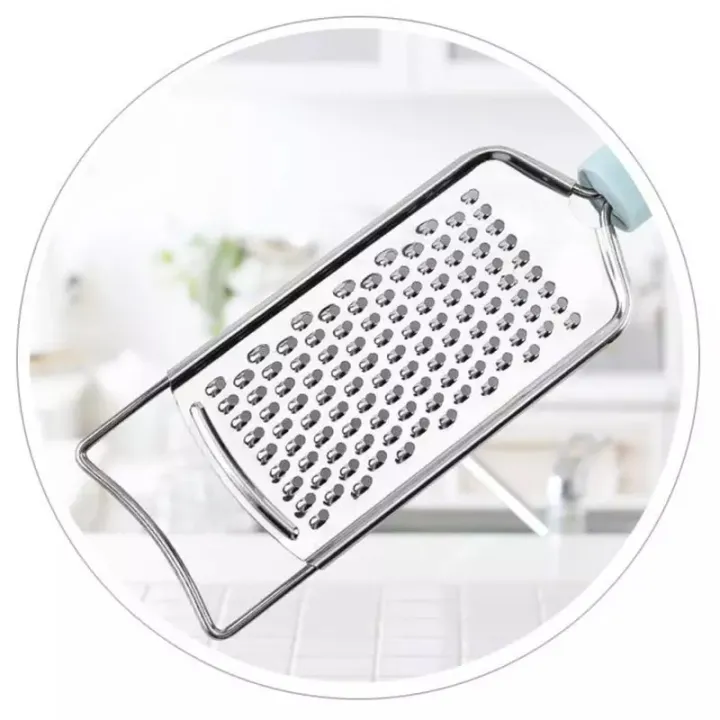 KITCHEN%20SUPPLIES/%20FINE%20KITCHEN%20SERIES%20HOME-II/%20STAINLESSSTEEL%20PEELER/%20PEELER/GRATER/%20garlic%20slicer/%20ginger%20slicer/%20garlic%20&%20ginger%20peeler%20-%20Image%204