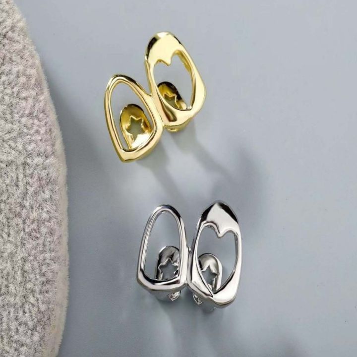 New%20Gold%20Color%20Hip%20Hop%20Tooth%20Grillz%20Hollow%20Heart%20Copper%20Dental%20Grillz%20Double%20Heart%20Shiny%20Zircon%20Teeth%20Caps%20Tooth%20Jewelry%20-%20Image%204