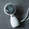Cute Hand-Held Fan, USB Charging, Portable Wind Power Ultra-Quiet Multi-Function Electric Fan. 