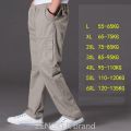 spring summer casual pants male big size 6XL Multi Pocket Jeans oversize Pants overalls elastic waist pants plus size men. 
