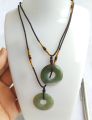 Jade circle pendant,  ကျောက်စိမ်း အဝိုင်းပုံဆွဲသီး၊. 