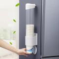 Household disposable cup holder punch-free wall-mounted cup rack. 