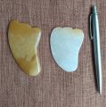 Yellow quartz  Guasha plate,  အဝါရောင် သလင်းကျောက် ကွာဆား ခြစ်ပြား အသဲပုံ. 