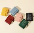 Crocodile Pattern PU Leather Small Wallet (David Jones). 