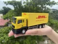 Diecast Metal MAN DHL Delivery Truck (1:64). 