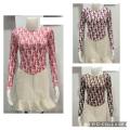 BKK 22 လိုင်းစင်း Dior design ဆွဲသား Top လက်ရှည် (free size ). 