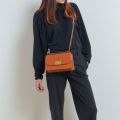 Charles & Keith -  Metallic Push-Lock Crossbody Bag - Orange. 