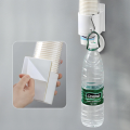 Household disposable cup holder punch-free wall-mounted cup rack. 