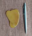 Yellow quartz  Guasha plate,  အဝါရောင် သလင်းကျောက် ကွာဆား ခြစ်ပြား အသဲပုံ. 