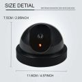 Realistic Looking Security Camera with Red LED Bulb. 