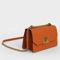 Charles & Keith -  Metallic Push-Lock Crossbody Bag - Orange. 