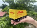 Diecast Metal MAN DHL Delivery Truck (1:64). 