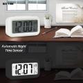 Smart Optical Control LCD Clock with Automatic Sensor Backlight, Snooze Alarm, Date and Temperature for Home and Office. 