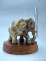 Fossilized wood elephant 3 inches size.  အင်ကြင်းကျောက် ဆင် ၃ လက်မ အရွယ်. 