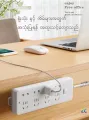 Power Strip Holder Desk Organiser wall-mounted Strong Seamless Home Free Punching Socket Hanging Wall Home Storage Supplies နံရံကပ် ချိတ်တွဲ. 
